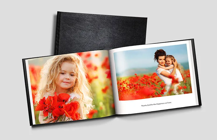 Libro de fotos personalizado de Printerpix con cubierta de cuero y diseño personalizado