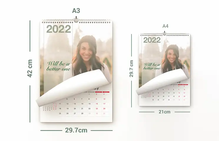 Fotos de perros en calendario de fotos de diseño personalizado colgado en la pared